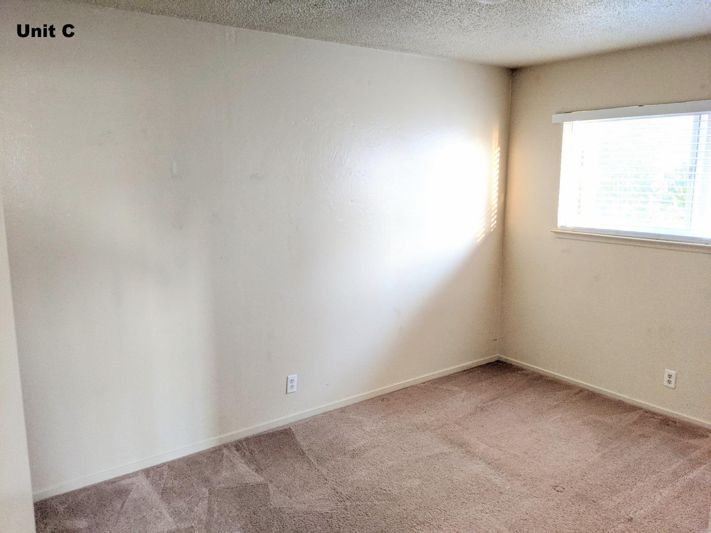 1830 48th Avenue Capitola, CA 95010 - Photo 31 of 32 an empty room with a window