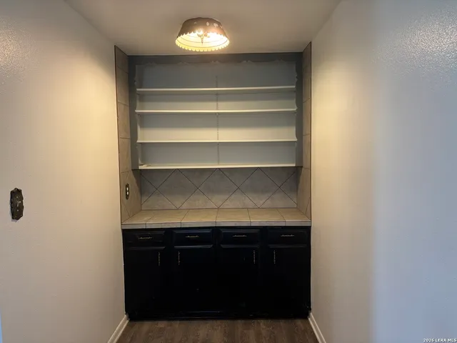 a bathroom with a shower and a bathtub