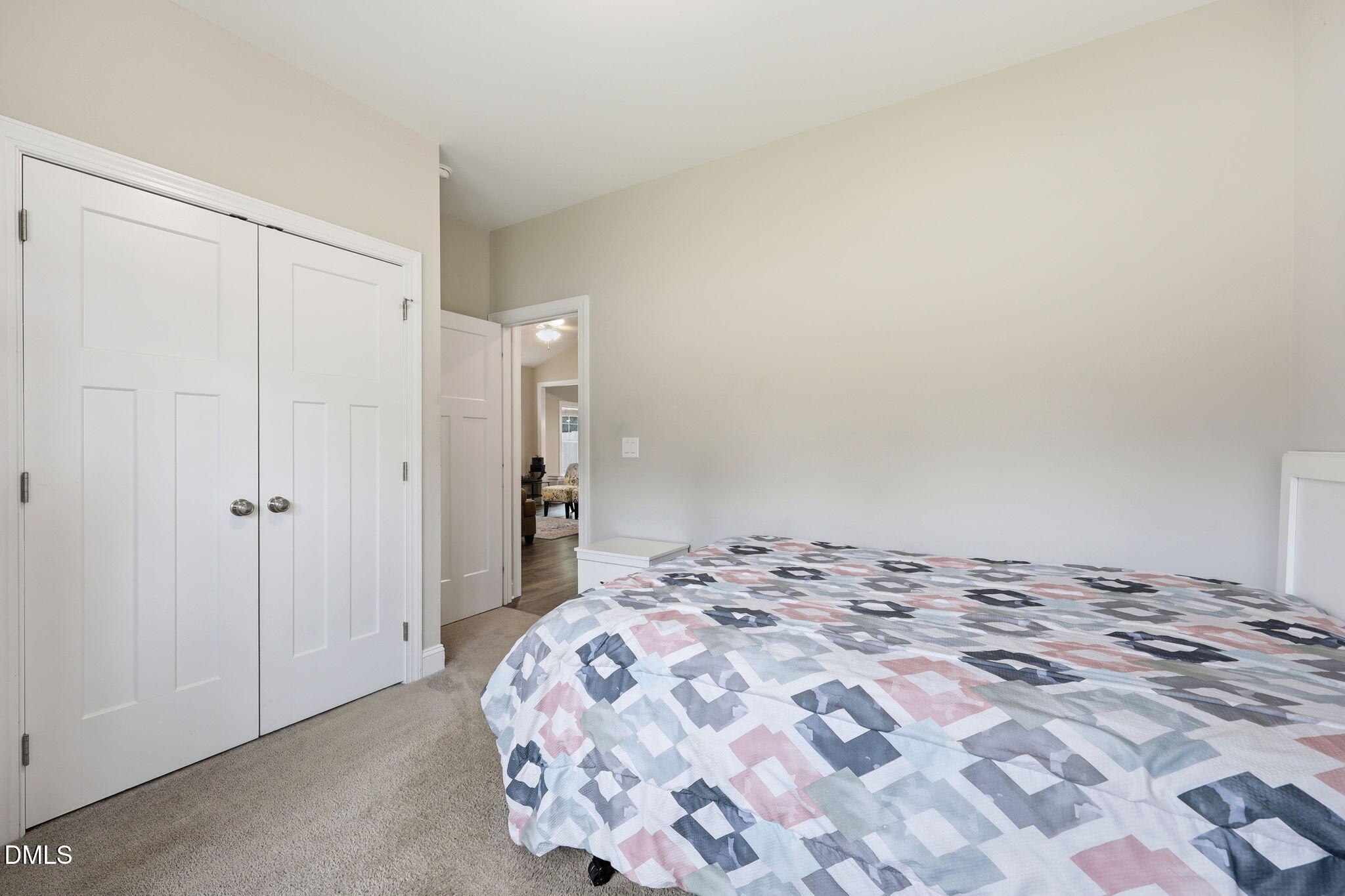 709 South Pollock Street Selma, NC 27576 - Photo 16 of 30 a bedroom with a bed and a window