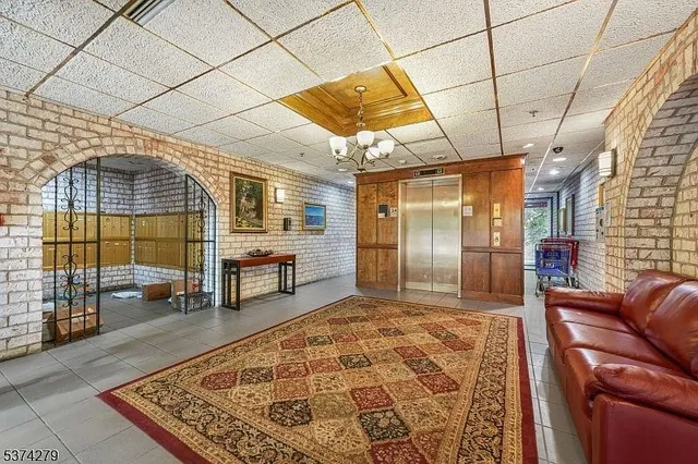 a view of a livingroom with furniture