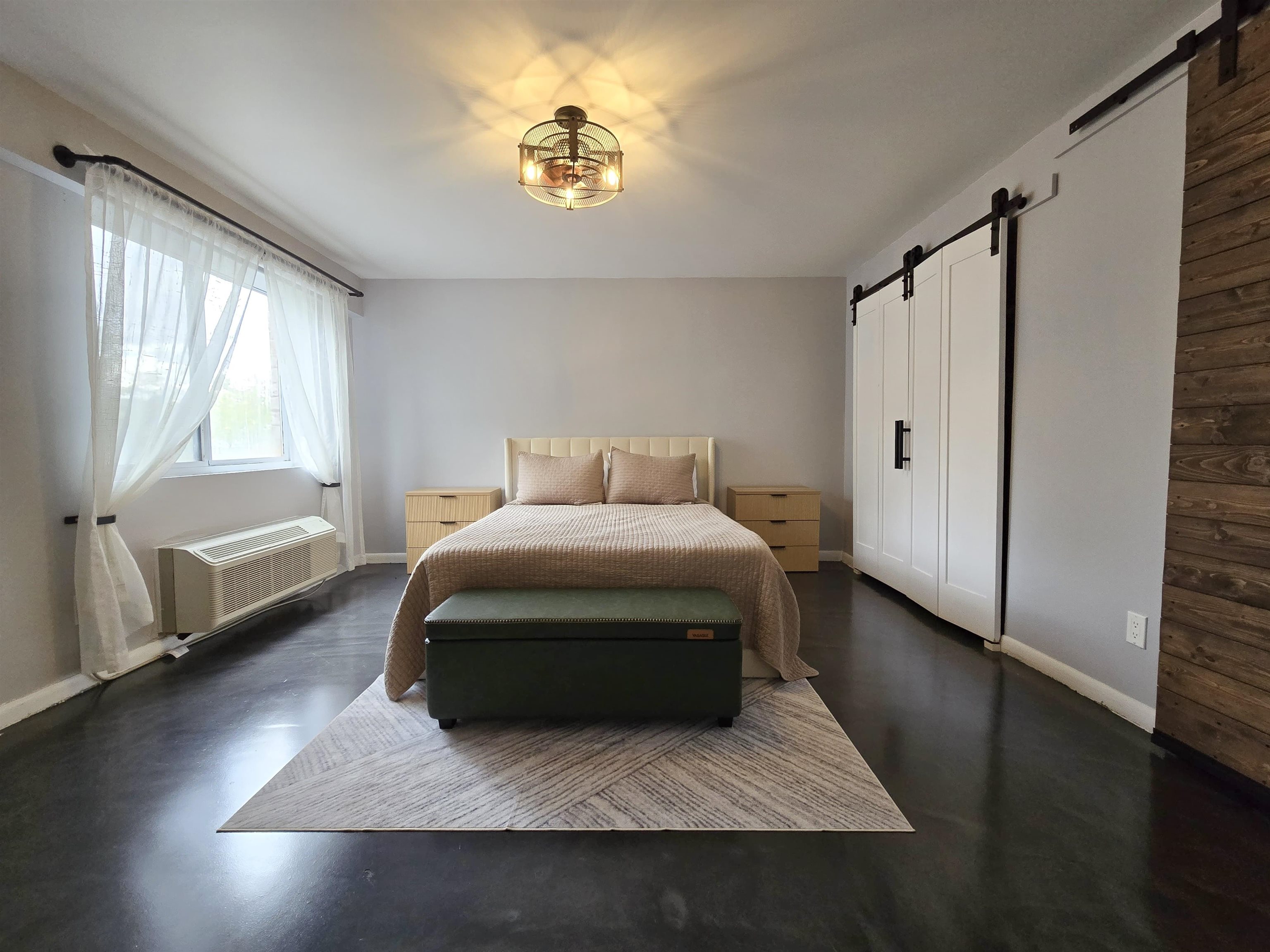 55 Clinton Place, Unit 308 Hackensack, NJ 07601 - Photo 8 of 19 a bedroom with a bed and a window