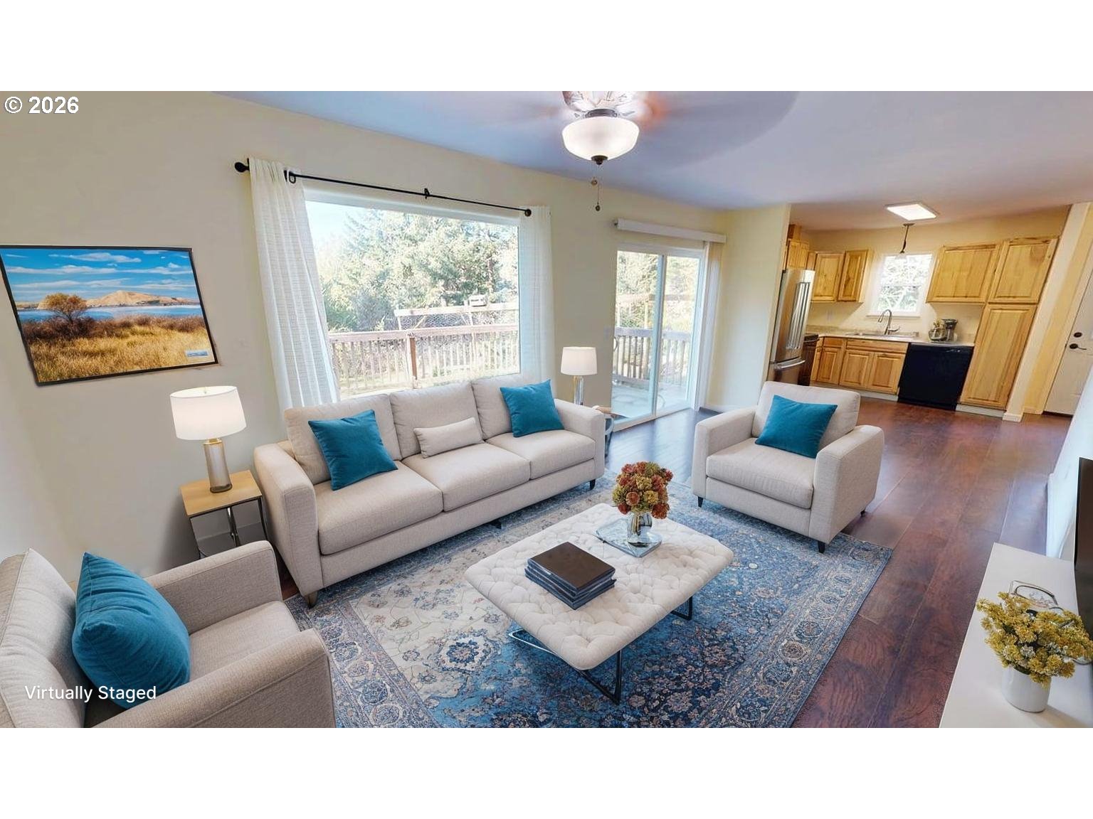94516 Riley Creek Way Gold Beach, OR 97444 - Photo 3 of 35 a living room with furniture a rug and a large window