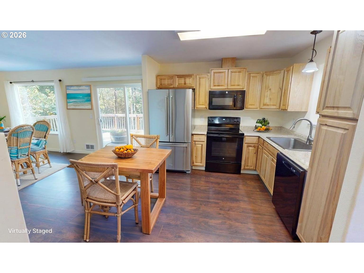 94516 Riley Creek Way Gold Beach, OR 97444 - Photo 8 of 35 a open kitchen with stainless steel appliances granite countertop a stove refrigerator and a sink