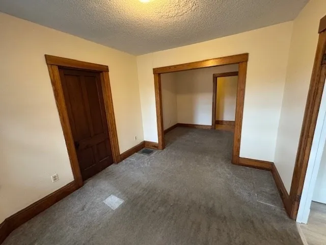 an empty room with closet