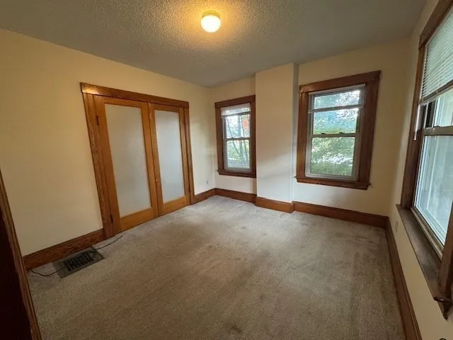 an empty room with windows