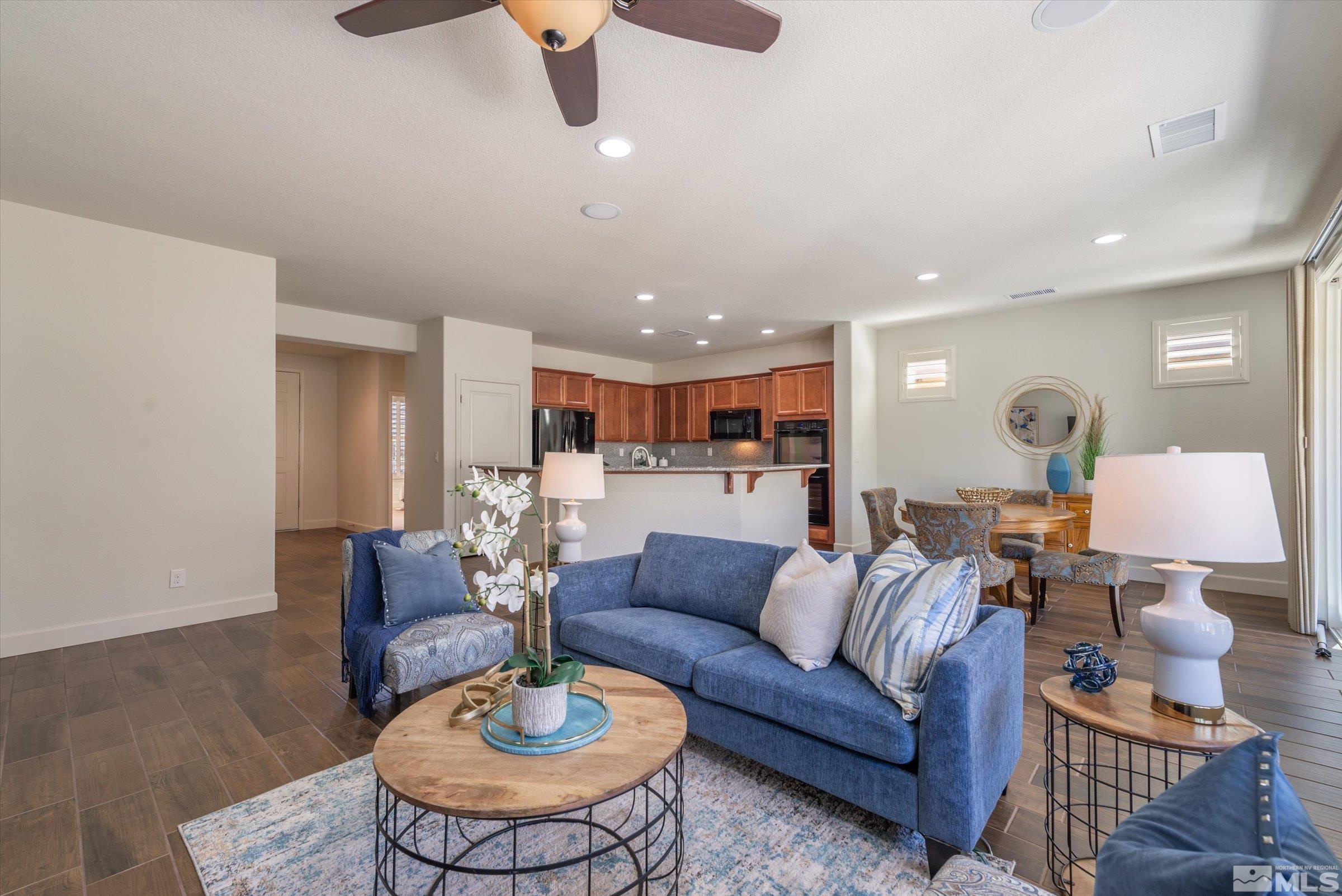 9207 Maplehurst Trail Reno, NV 89523 - Photo 12 of 40 a living room with furniture and view of kitchen