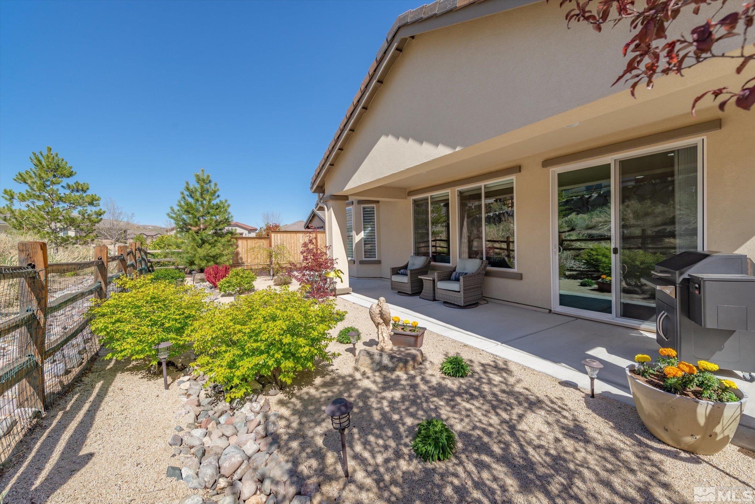 9207 Maplehurst Trail Reno, NV 89523 - Photo 19 of 40 a front view of a house with a patio