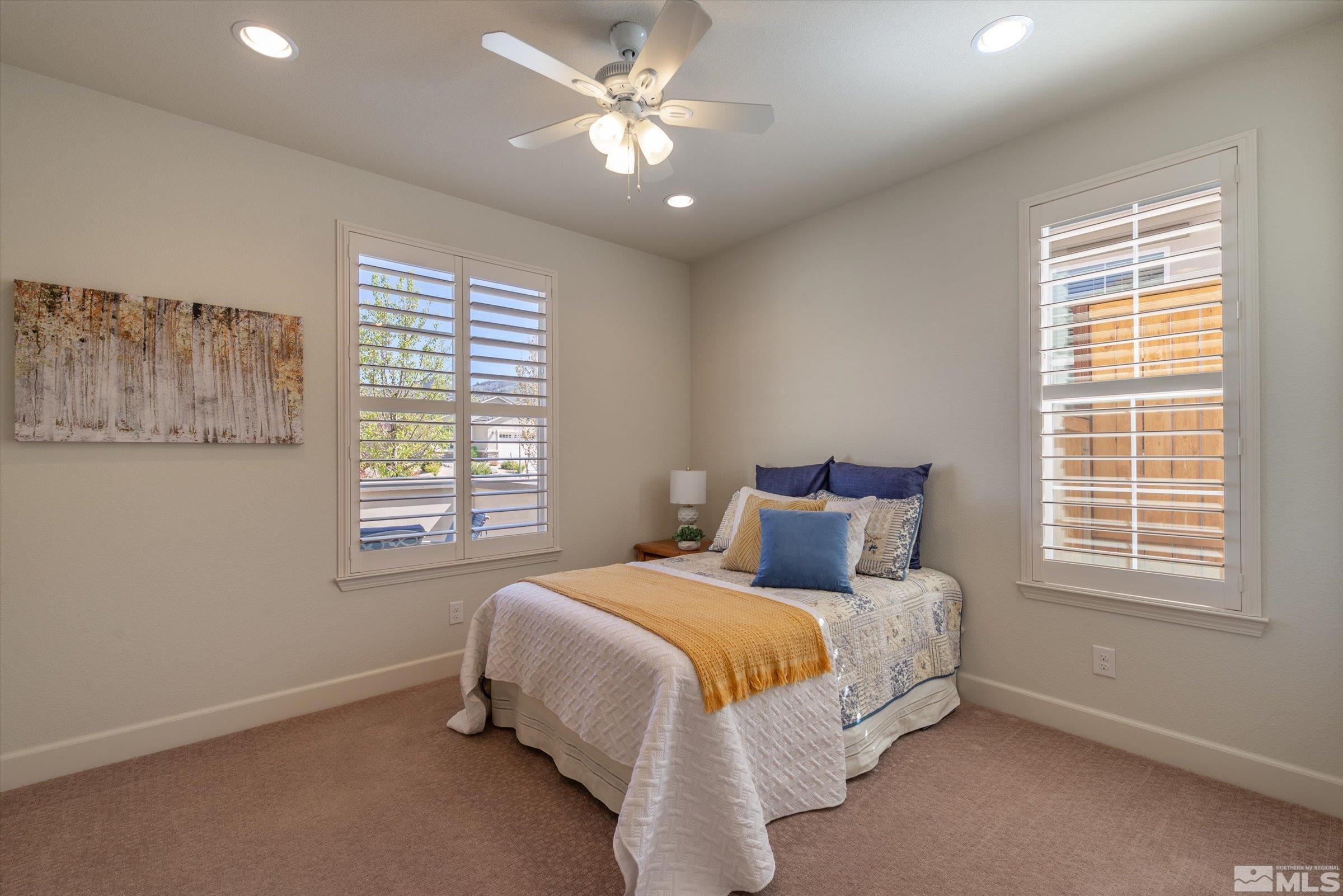9207 Maplehurst Trail Reno, NV 89523 - Photo 27 of 40 a bedroom with a bed and a window