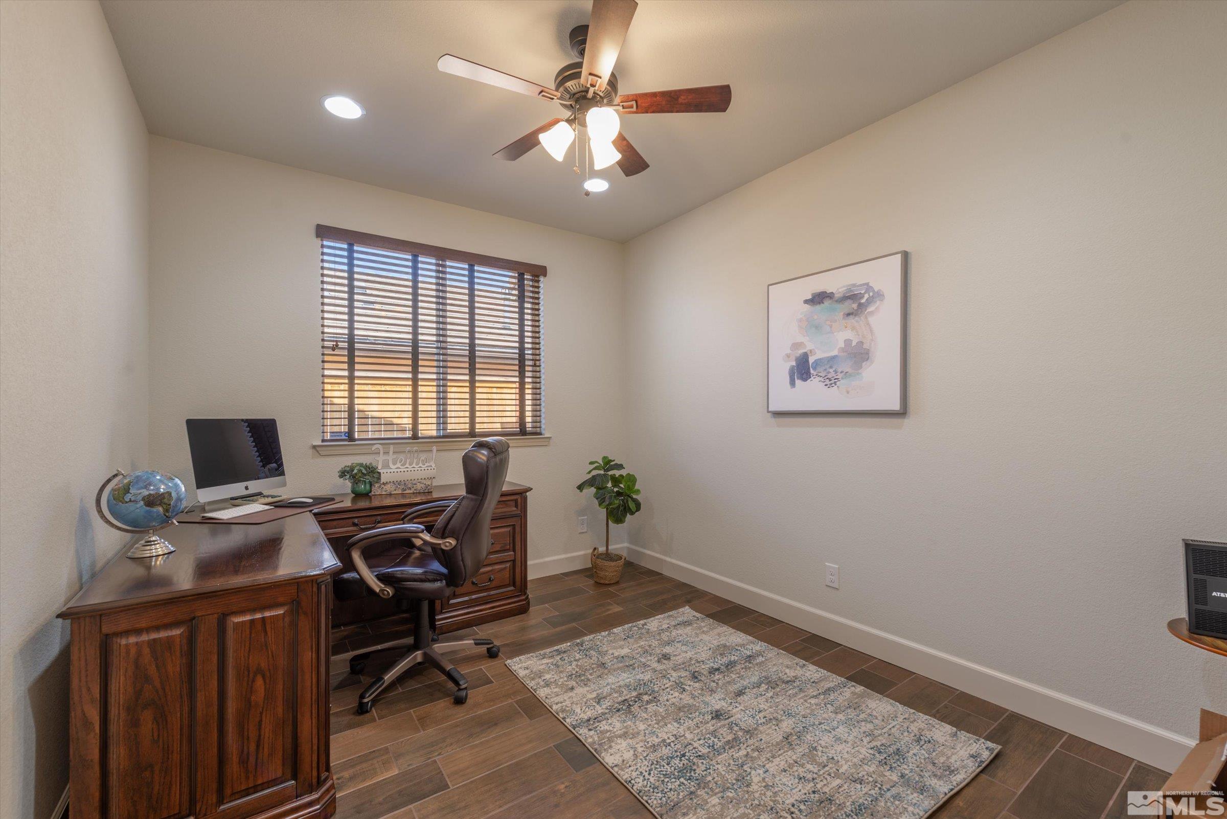 9207 Maplehurst Trail Reno, NV 89523 - Photo 29 of 40 a view of a workspace with furniture and a window
