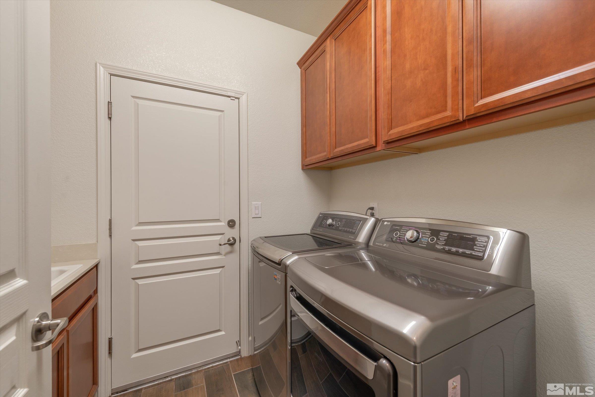 9207 Maplehurst Trail Reno, NV 89523 - Photo 30 of 40 a utility room with dryer and washer