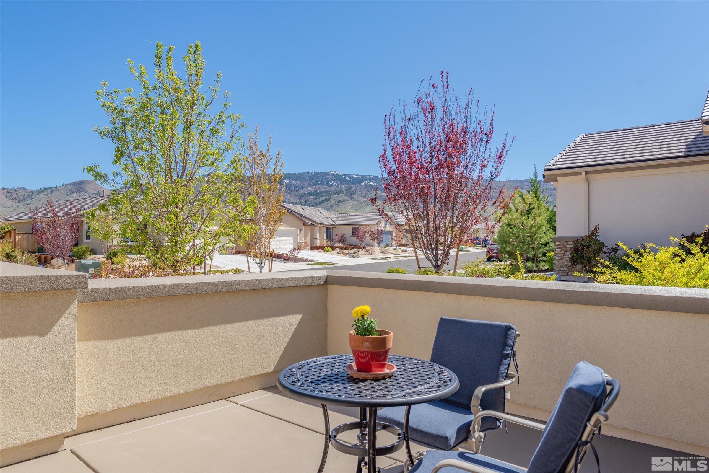 9207 Maplehurst Trail Reno, NV 89523 - Photo 4 of 40 a view of a chairs and table in a patio