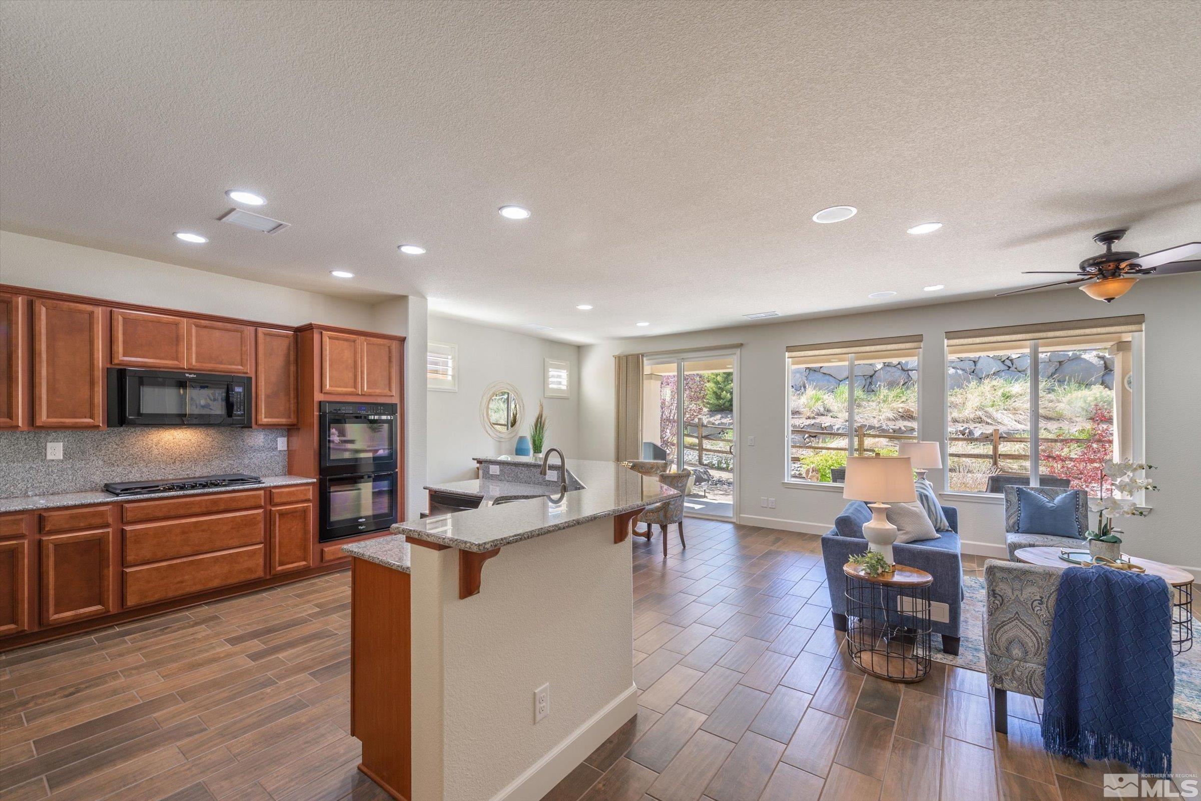 9207 Maplehurst Trail Reno, NV 89523 - Photo 9 of 40 a large kitchen with lots of counter space