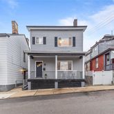 a house view with a outdoor space