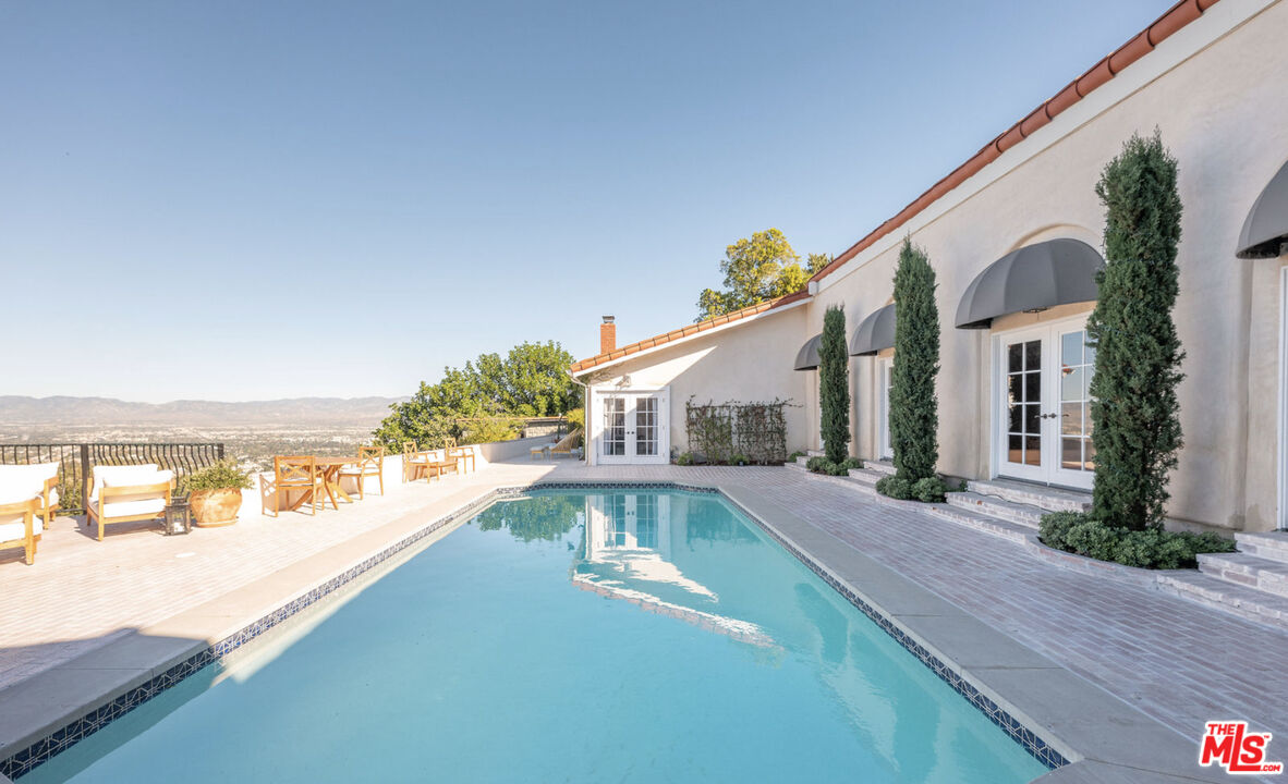 a view of a house with a ocean view