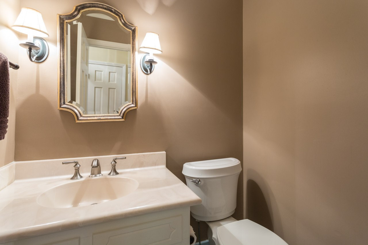 10205 Bushveld Lane Raleigh, NC 27613 - Photo 15 of 22 Half bath off the foyer convenient for guests Half Bath