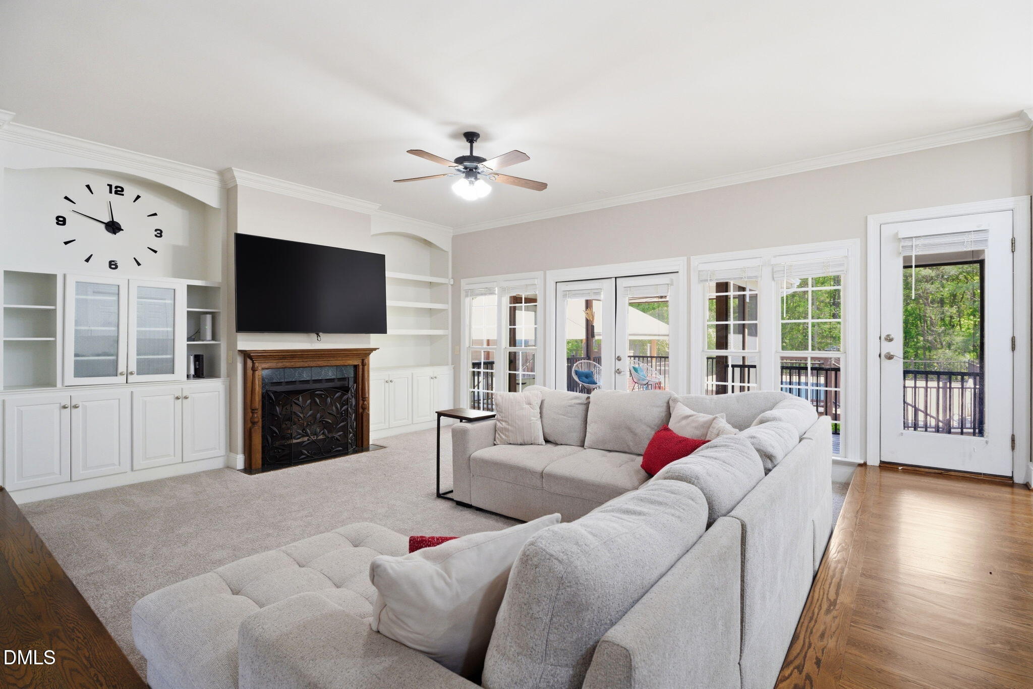 5416 Pulley Town Road Zebulon, NC 27597 - Photo 13 of 74 a living room with furniture a fireplace and a flat screen tv