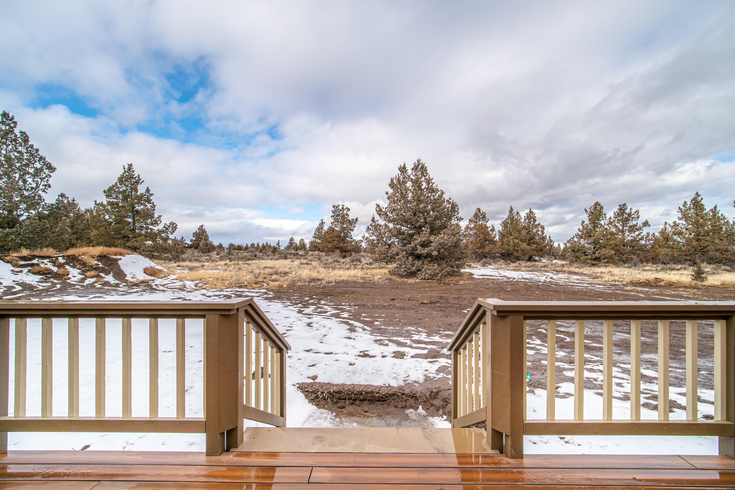 62089 Torkelson Road Bend, OR 97701 - Photo 9 of 33 Back Deck (Mountain views not visible today due to clouds)