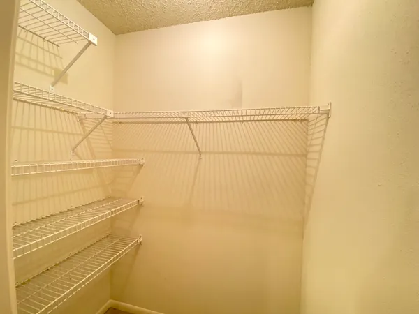 a view of a livingroom with a staircase