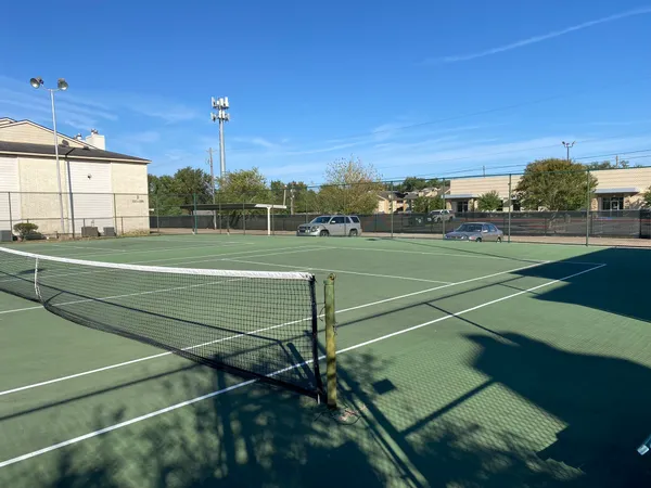 a view of a house with swimming pool and sitting area