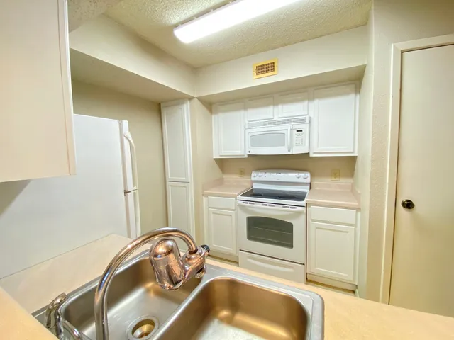 a bathroom with a sink and a bathtub