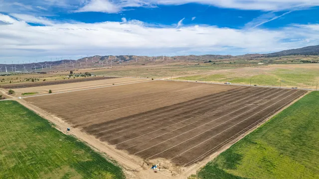 a view of an ocean and sunset