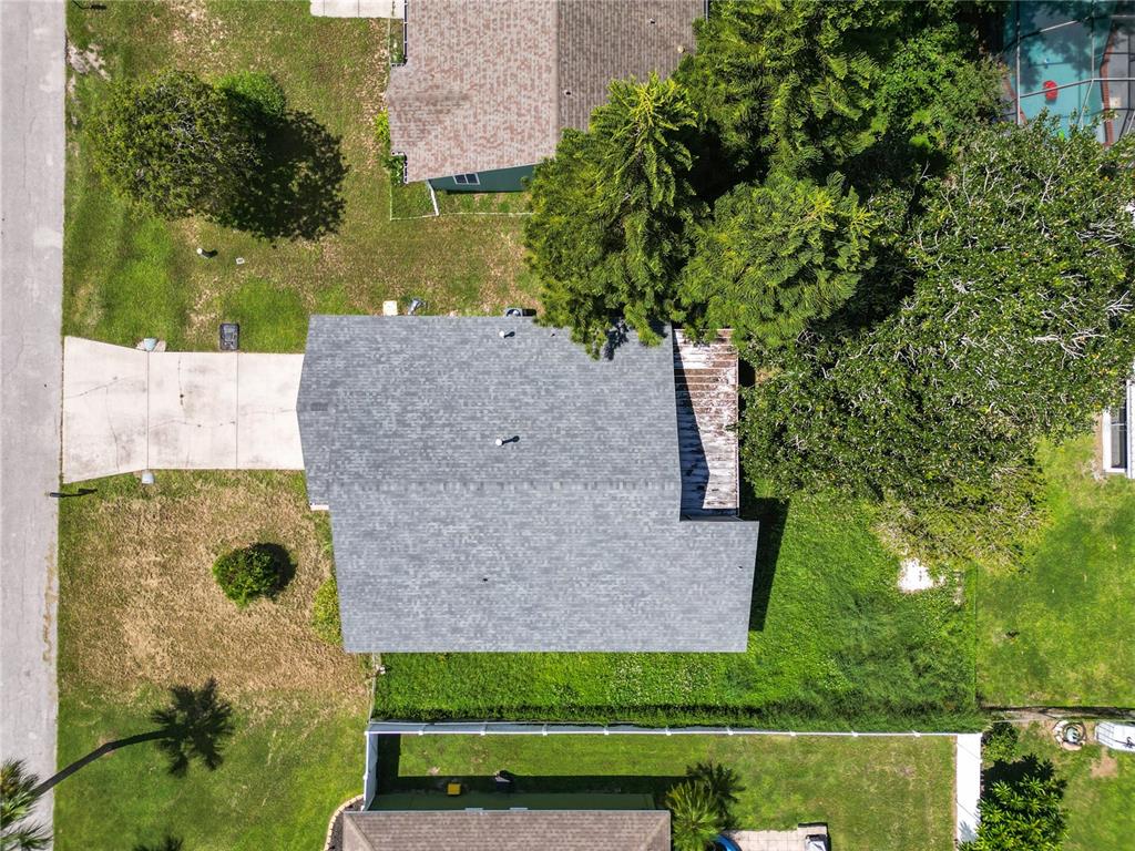 3307 Fox Ridge Drive Winter Haven, FL 33884 - Photo 23 of 27 an aerial view of a house with a yard