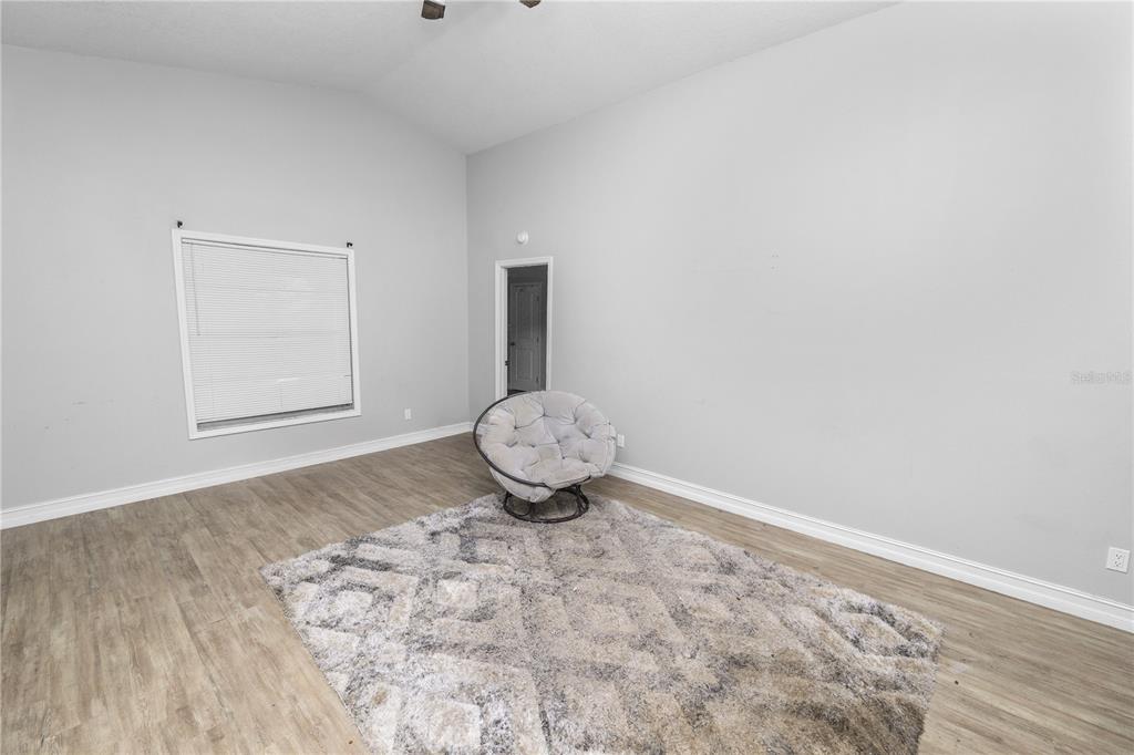 3307 Fox Ridge Drive Winter Haven, FL 33884 - Photo 10 of 27 an empty room with a window