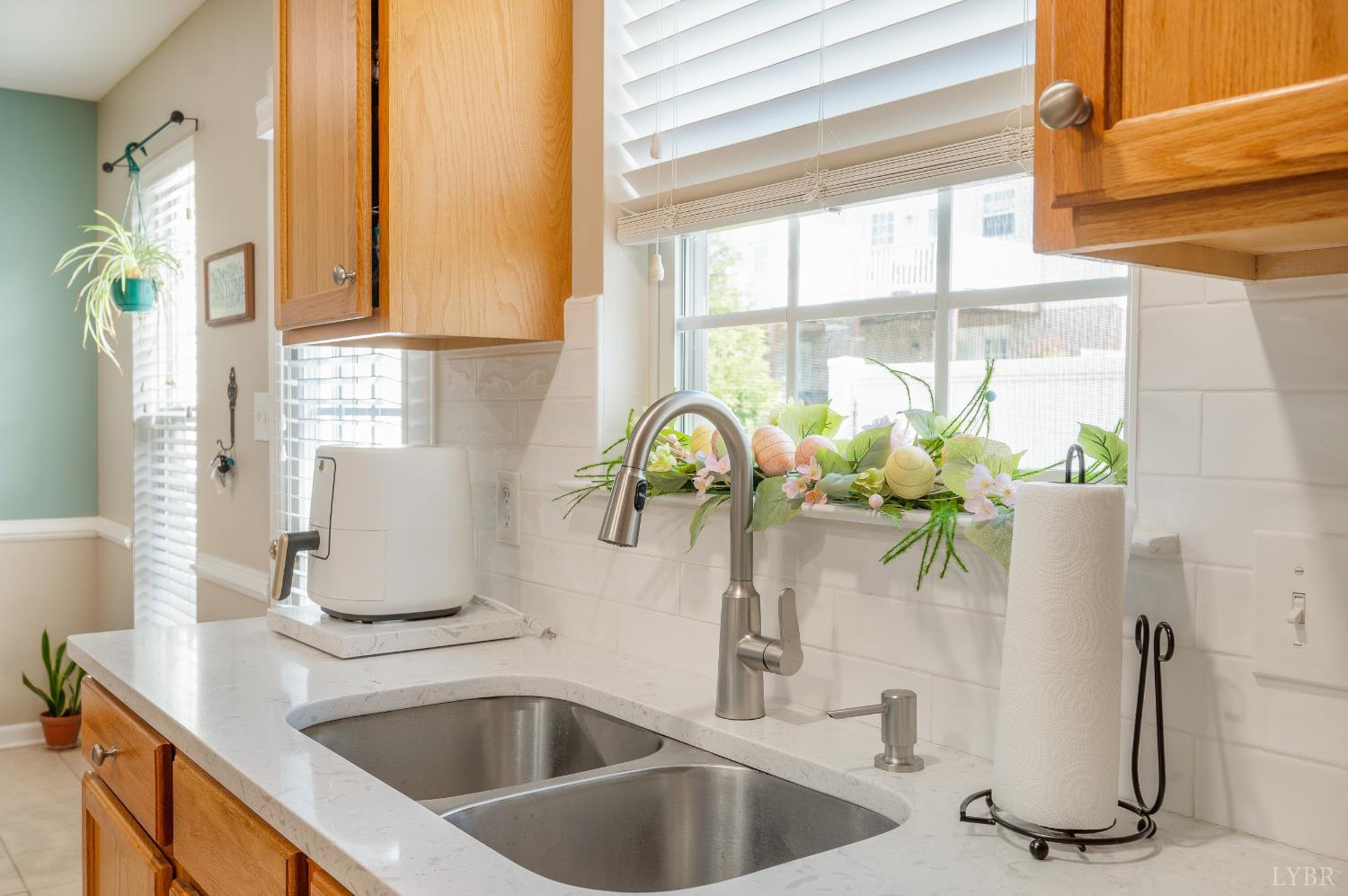 1011 Middle View Drive Forest, VA 24551 - Photo 12 of 44 a bathroom sink a potted plant and a window