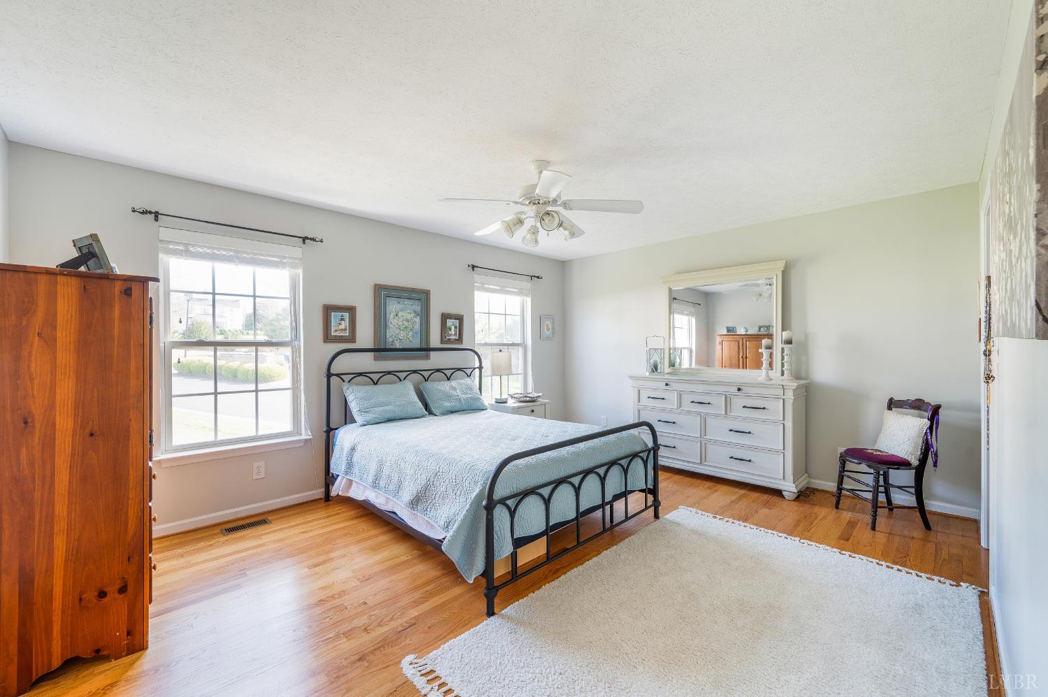 1011 Middle View Drive Forest, VA 24551 - Photo 19 of 44 a spacious bedroom with a bed and a window