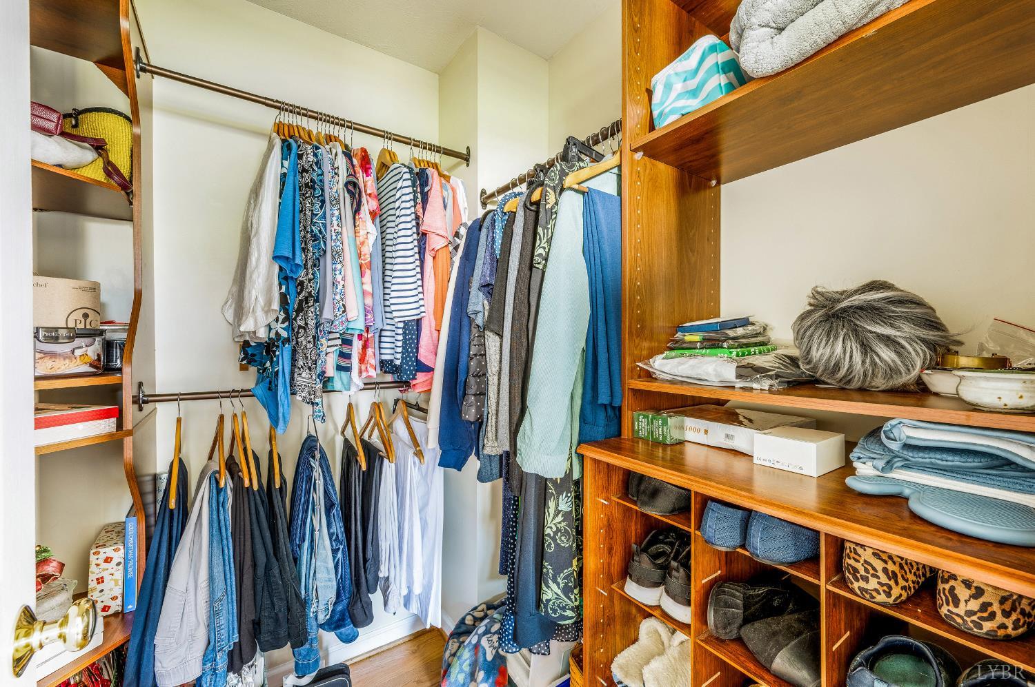 1011 Middle View Drive Forest, VA 24551 - Photo 21 of 44 a view of walk in closet with clothes and shoes