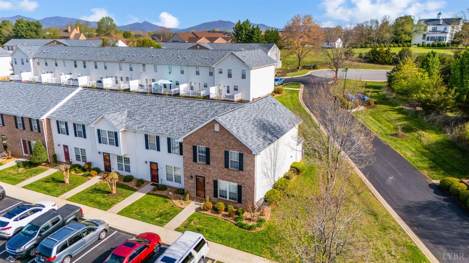 1011 Middle View Drive Forest, VA 24551 - Photo 35 of 44 an aerial view of multiple houses with a yard