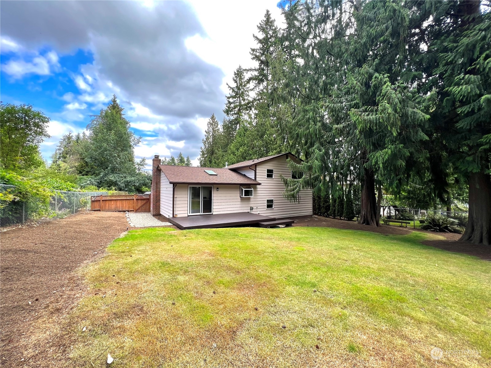 8 156th Place Southwest Bothell, WA 98012 - Photo 18 of 33 a view of a house with pool and a yard