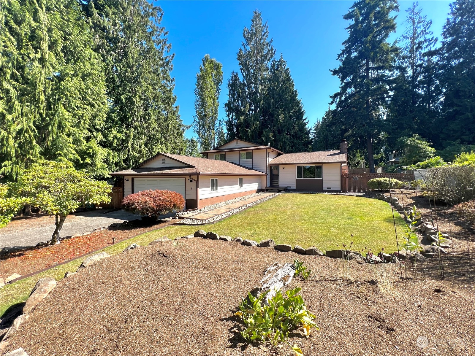 8 156th Place Southwest Bothell, WA 98012 - Photo 2 of 33 a view of a house with a yard and large tree