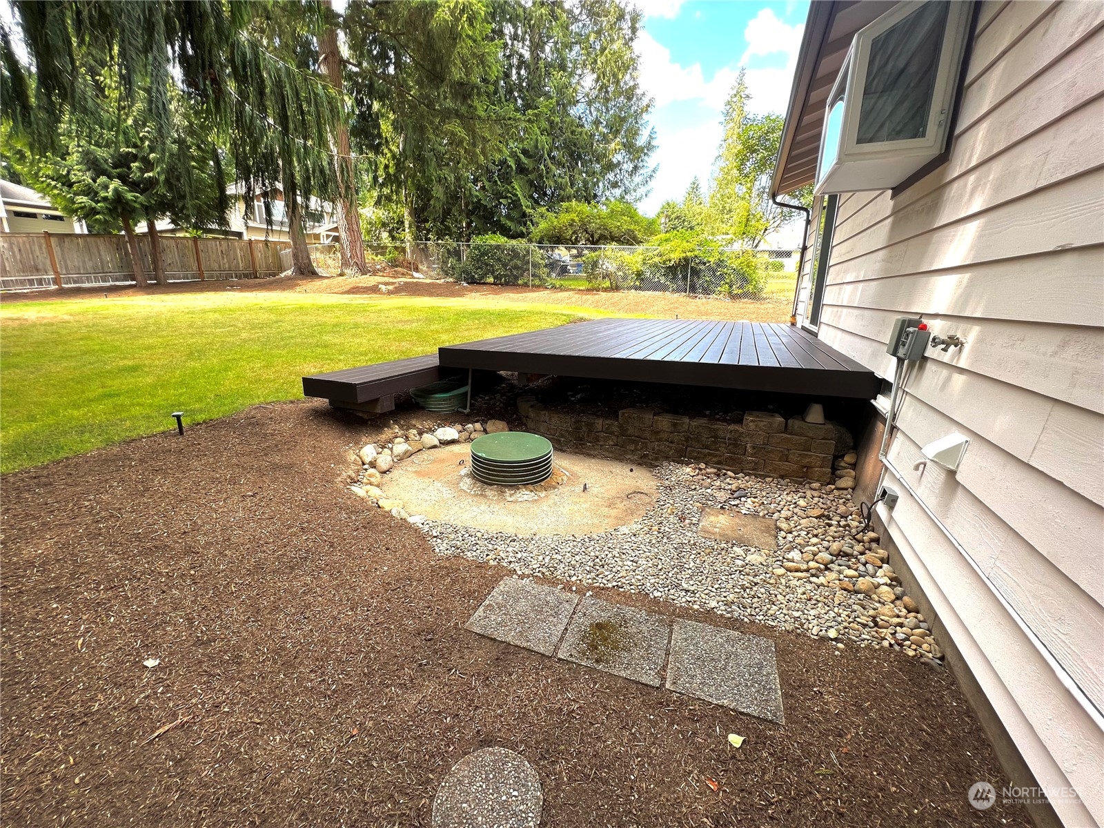 8 156th Place Southwest Bothell, WA 98012 - Photo 22 of 33 a view of swimming pool with a yard and seating area