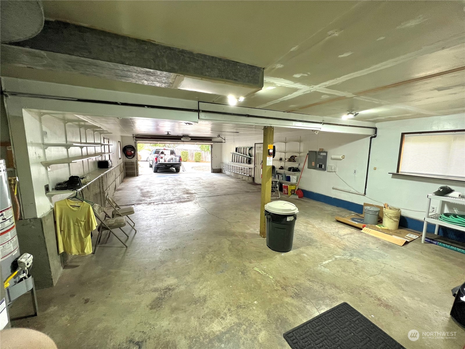 8 156th Place Southwest Bothell, WA 98012 - Photo 32 of 33 a kitchen with lots of counter top space and living room