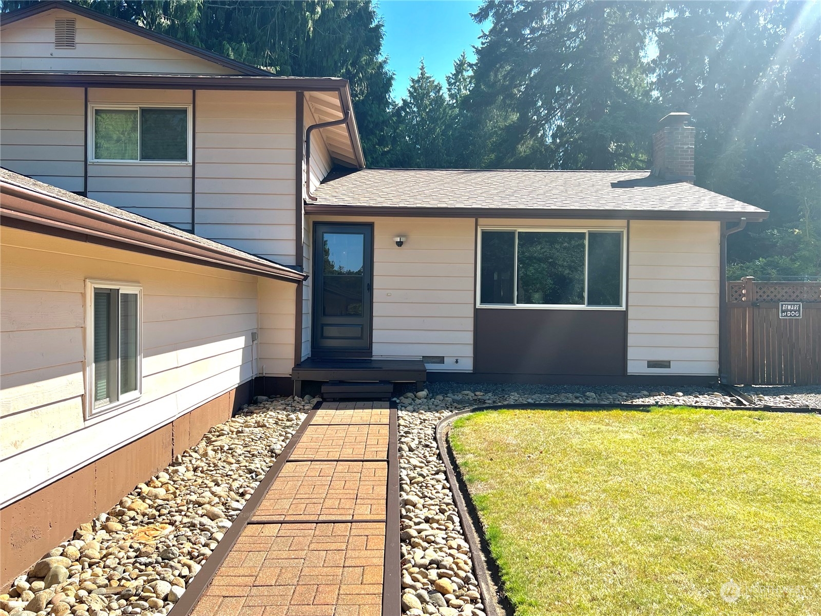 8 156th Place Southwest Bothell, WA 98012 - Photo 5 of 33 a front view of a house with a yard