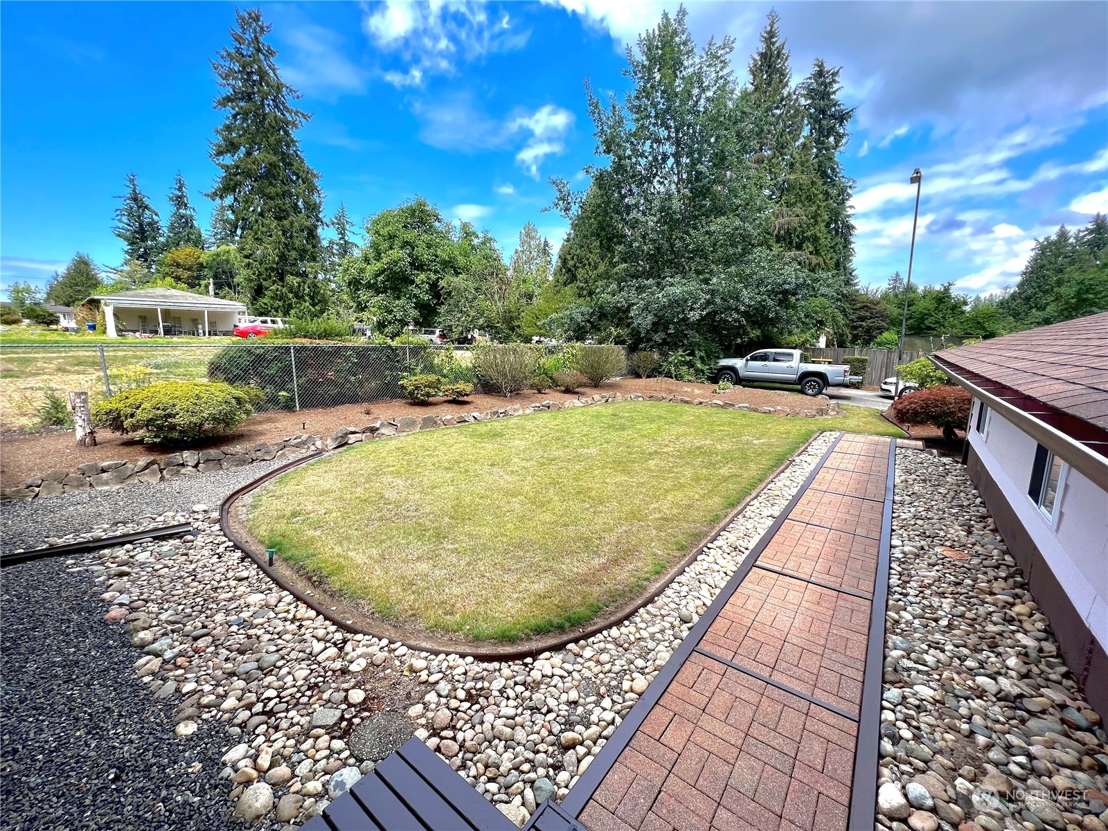 8 156th Place Southwest Bothell, WA 98012 - Photo 6 of 33 a view of a swimming pool with a patio