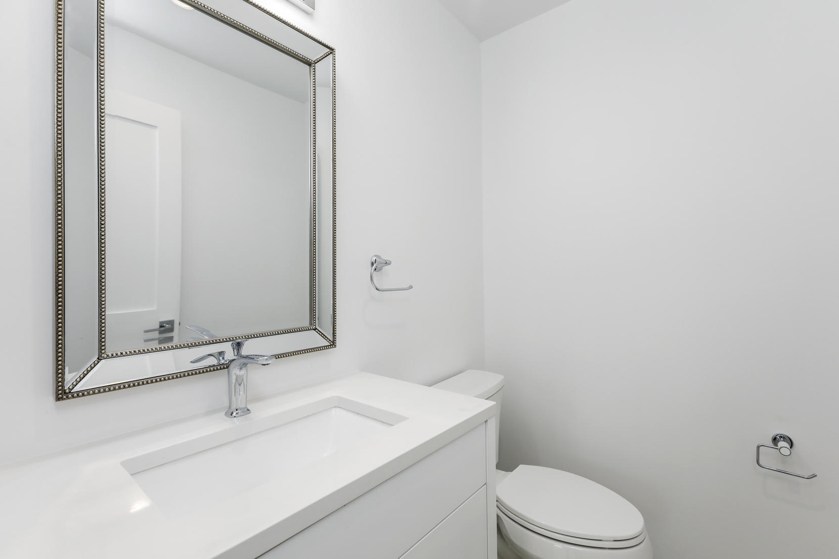 25 Brookside Road Darien, CT 06820 - Photo 14 of 30 a bathroom with a sink a toilet and mirror