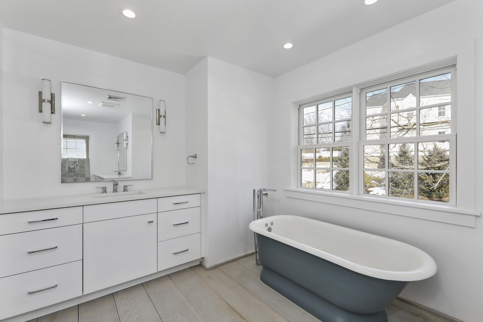 25 Brookside Road Darien, CT 06820 - Photo 19 of 30 a bathroom with a tub sink and mirror