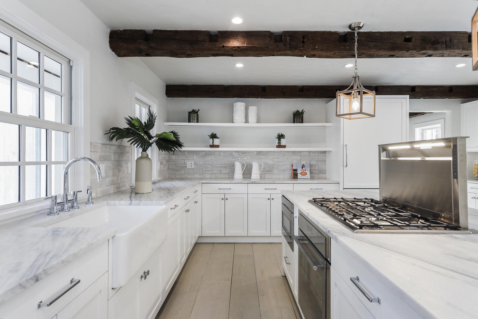 25 Brookside Road Darien, CT 06820 - Photo 4 of 30 a kitchen with stainless steel appliances granite countertop a sink stove and cabinets