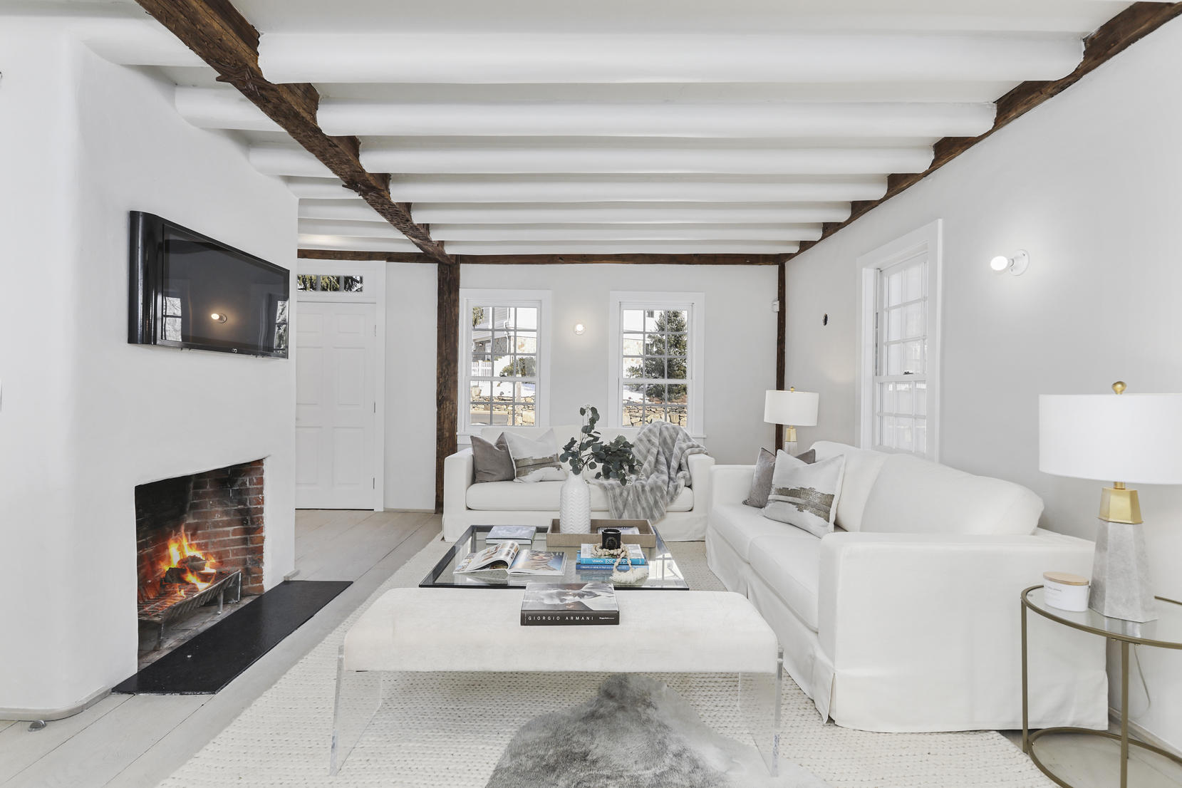 25 Brookside Road Darien, CT 06820 - Photo 8 of 30 a living room with furniture and a fireplace