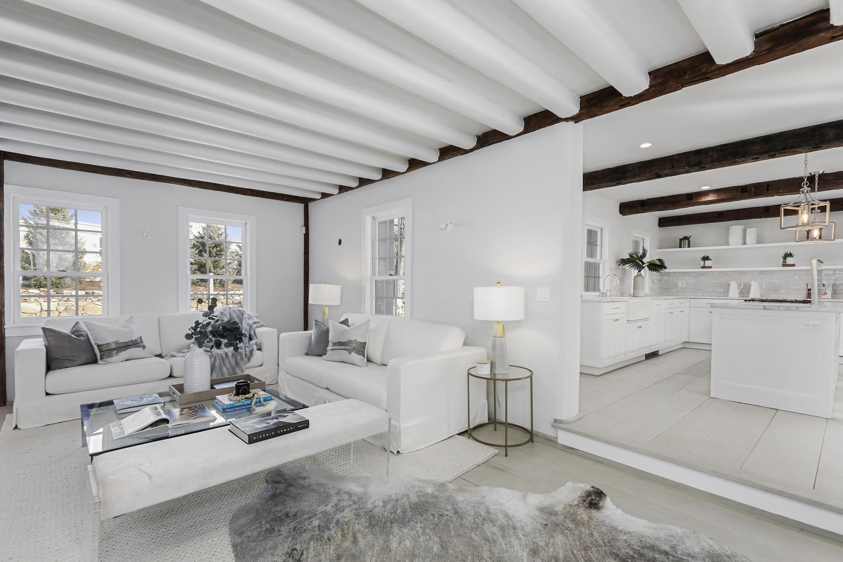 25 Brookside Road Darien, CT 06820 - Photo 10 of 30 a living room with furniture and flowers