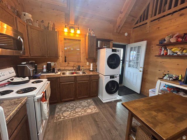 19075 West Honesty Cove Duchesne, UT 84021 - Photo 6 of 44 Kitchen area featuring wood-finish flooring and wood paneling