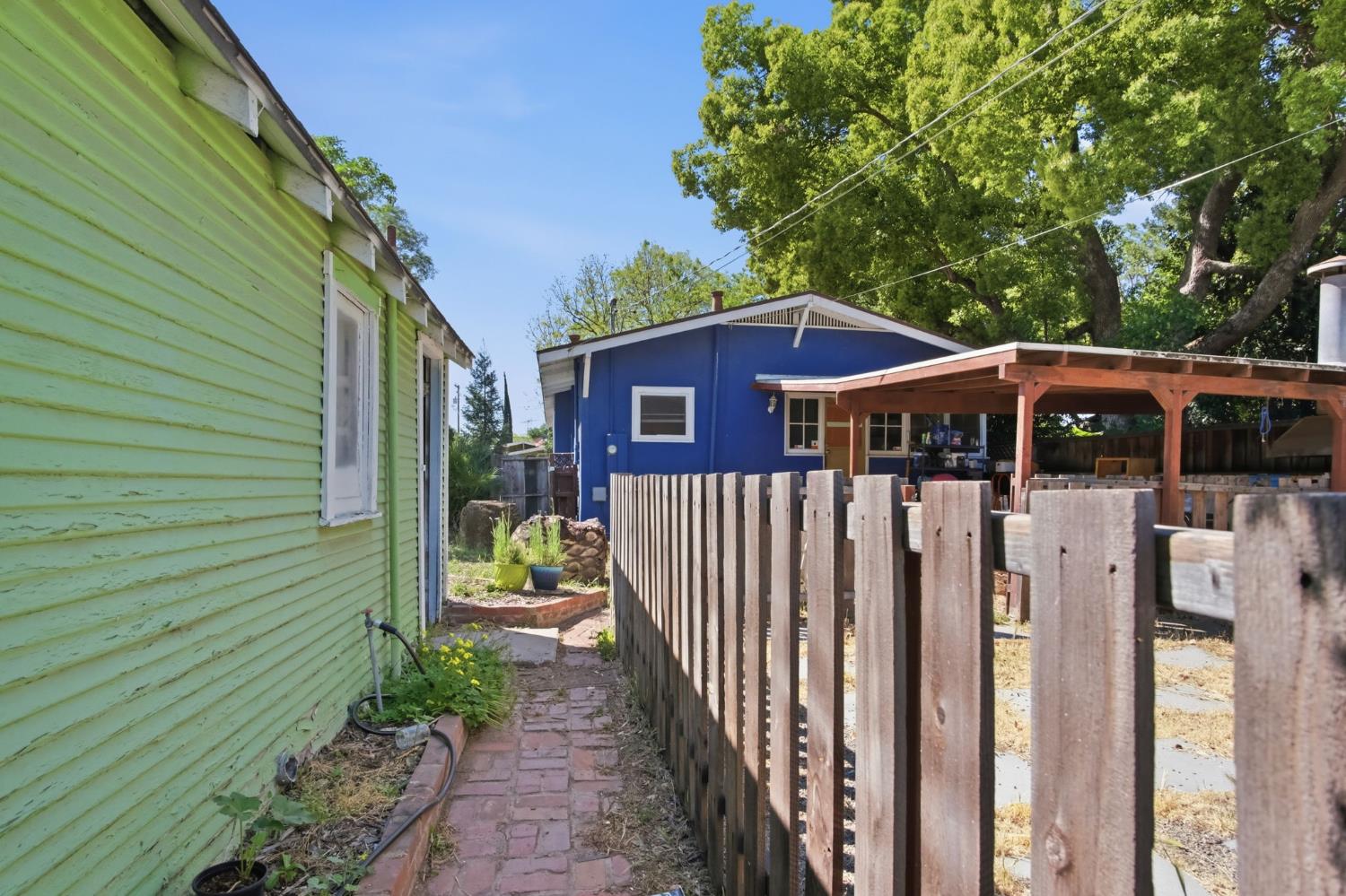 557 Florence Street Turlock, CA 95380 - Photo 23 of 36 a view of front of house with a yard