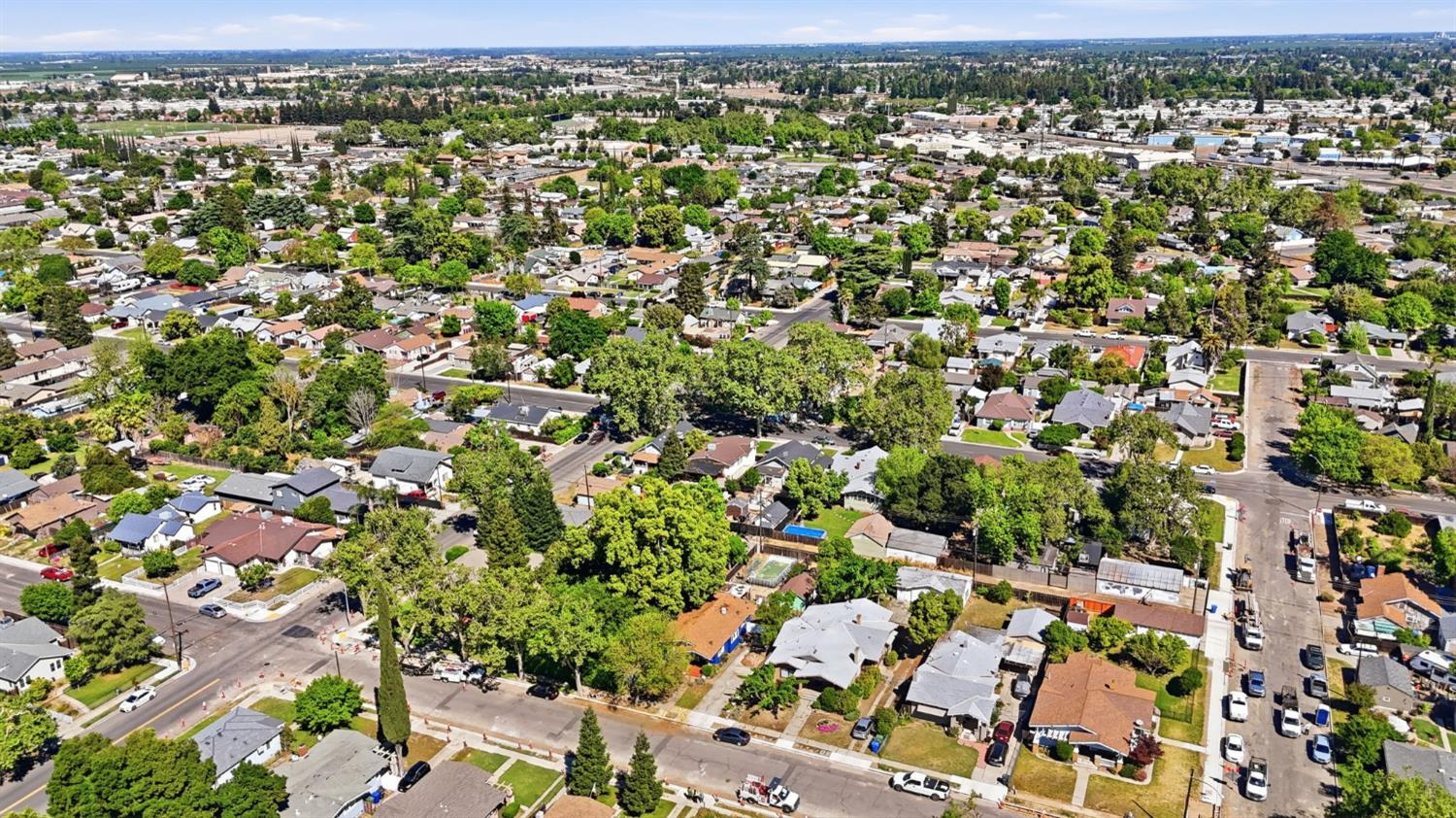 557 Florence Street Turlock, CA 95380 - Photo 31 of 36 an aerial view of residential houses with outdoor space
