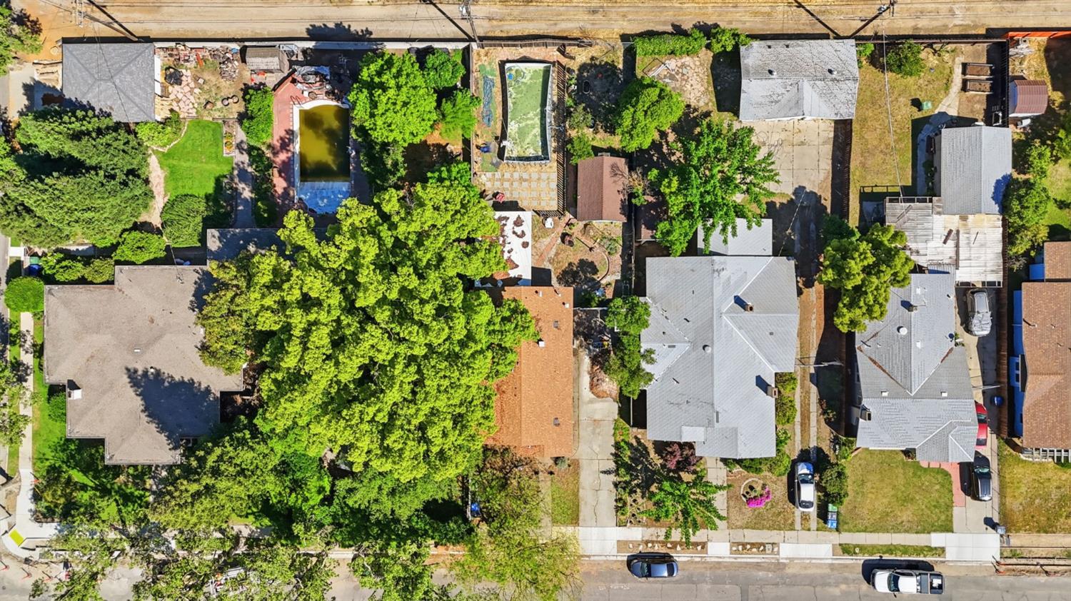 557 Florence Street Turlock, CA 95380 - Photo 33 of 36 an aerial view of residential houses with outdoor space and street view