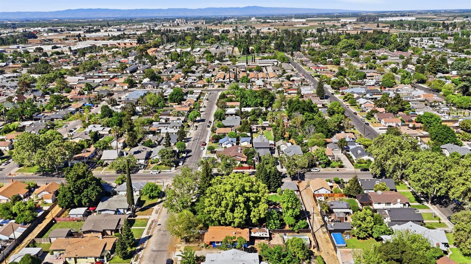 557 Florence Street Turlock, CA 95380 - Photo 34 of 36 an aerial view of residential houses with city view