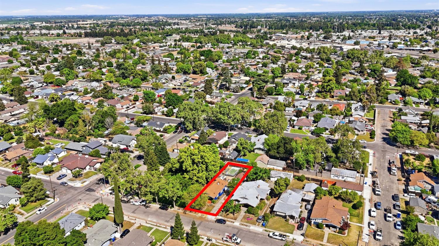 557 Florence Street Turlock, CA 95380 - Photo 35 of 36 an aerial view of residential houses with outdoor space
