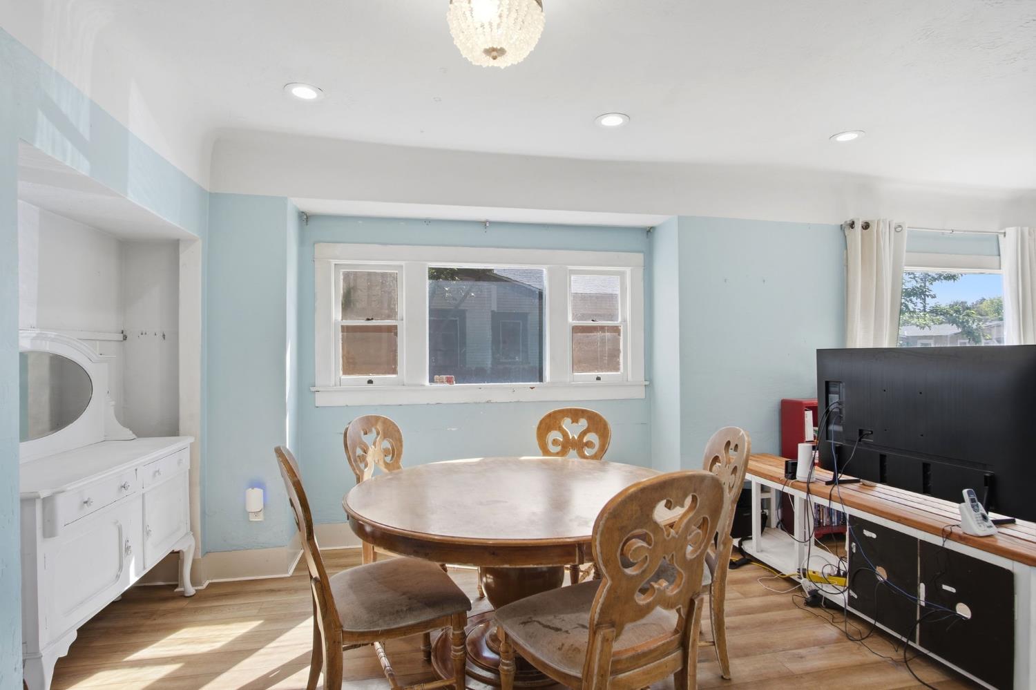 557 Florence Street Turlock, CA 95380 - Photo 9 of 36 a living room with furniture and a flat screen tv