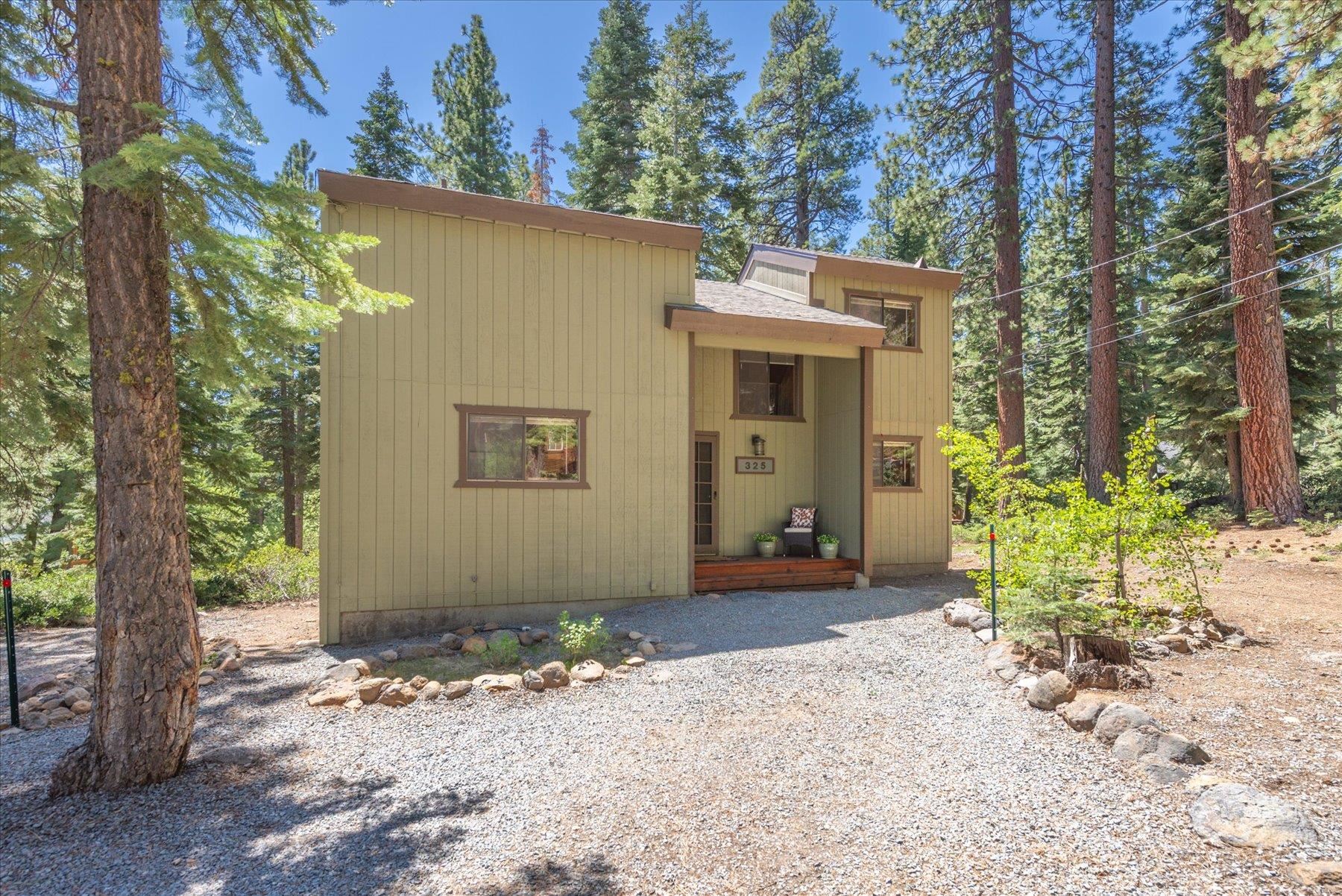 325 North Ridge Road Carnelian Bay, CA 96140 - Photo 2 of 22 a view of a house with a yard